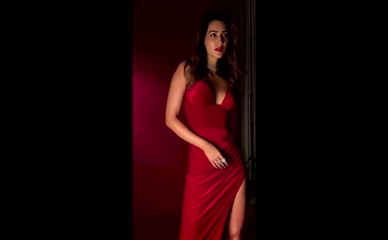 KRITI SANON in Kriti Sanon In A Red Maxi Dress Featuring A High Slit At Filmfare Awards 2022