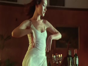 MAGGIE Q in NAKED WEAPON (2002)