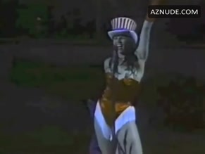 LUCY LAWLESS NUDE/SEXY SCENE IN DETROIT RED WINGS GAME: NATIONAL ANTHEM