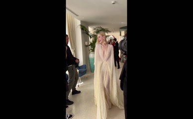 ELLE FANNING in Elle Fanning Hotel Martinez During The 77Th Cannes Film Festival