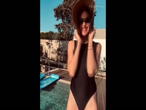 GAL GADOT in GAL GADOT SIZZLES IN SEXY BLACK SWIMSUIT2023
