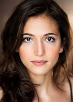 MAGGIE NAOURI