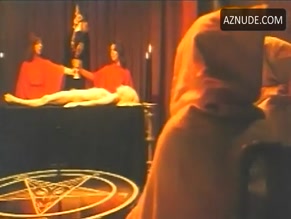 MAGGIE FITZGERALD in THE SATANIC RITES OF DRACULA (1974)