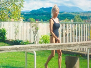 PAMELA ANDERSON NUDE/SEXY SCENE IN ROSEBUSH PRUNING